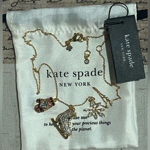 Kate Spade Gold Charm Necklace Winter ice skate snow flake new with dust bag